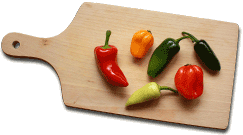 fresh peppers on cutting board